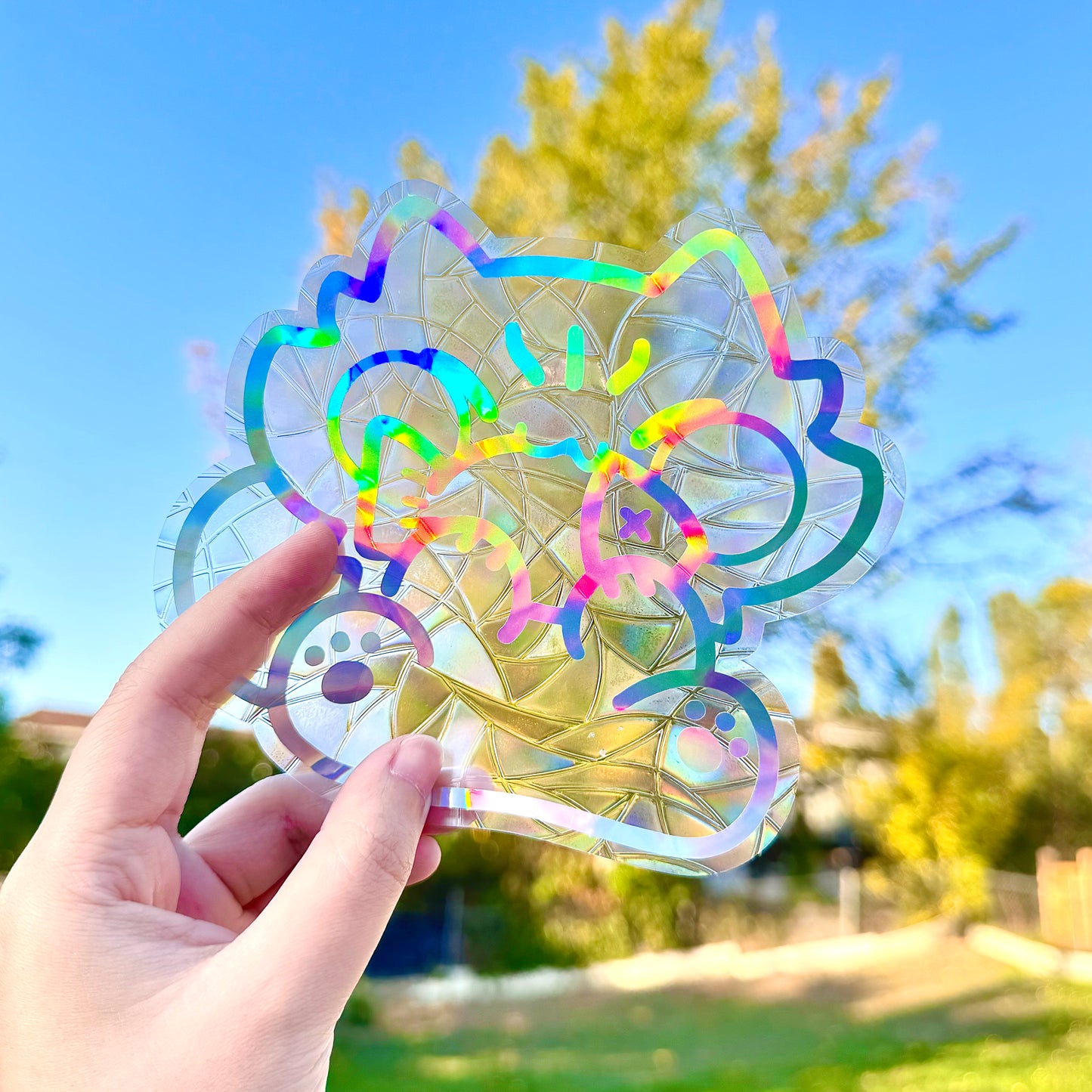 Cute cat eating fish Suncatcher
