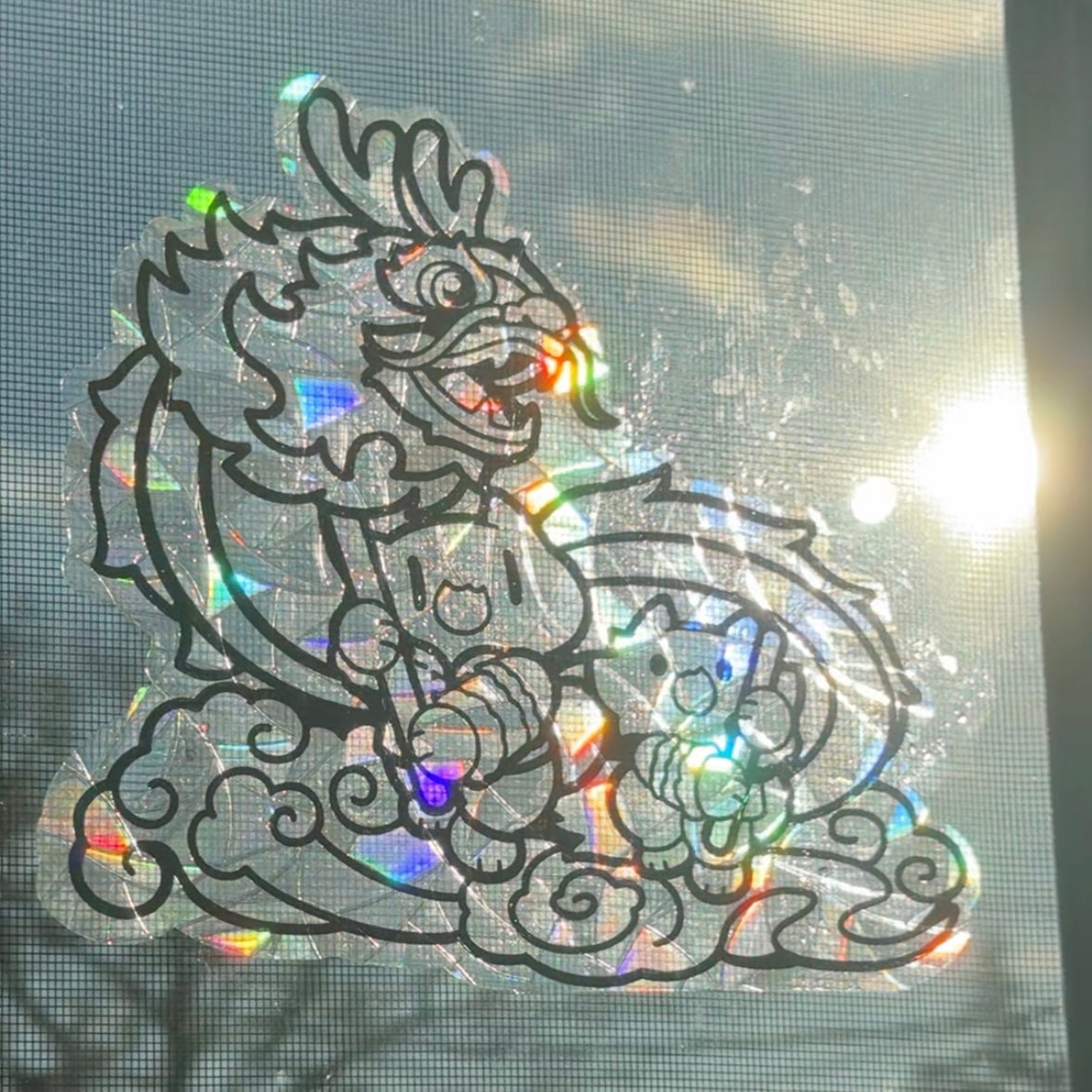 Dragon dance large Suncatcher