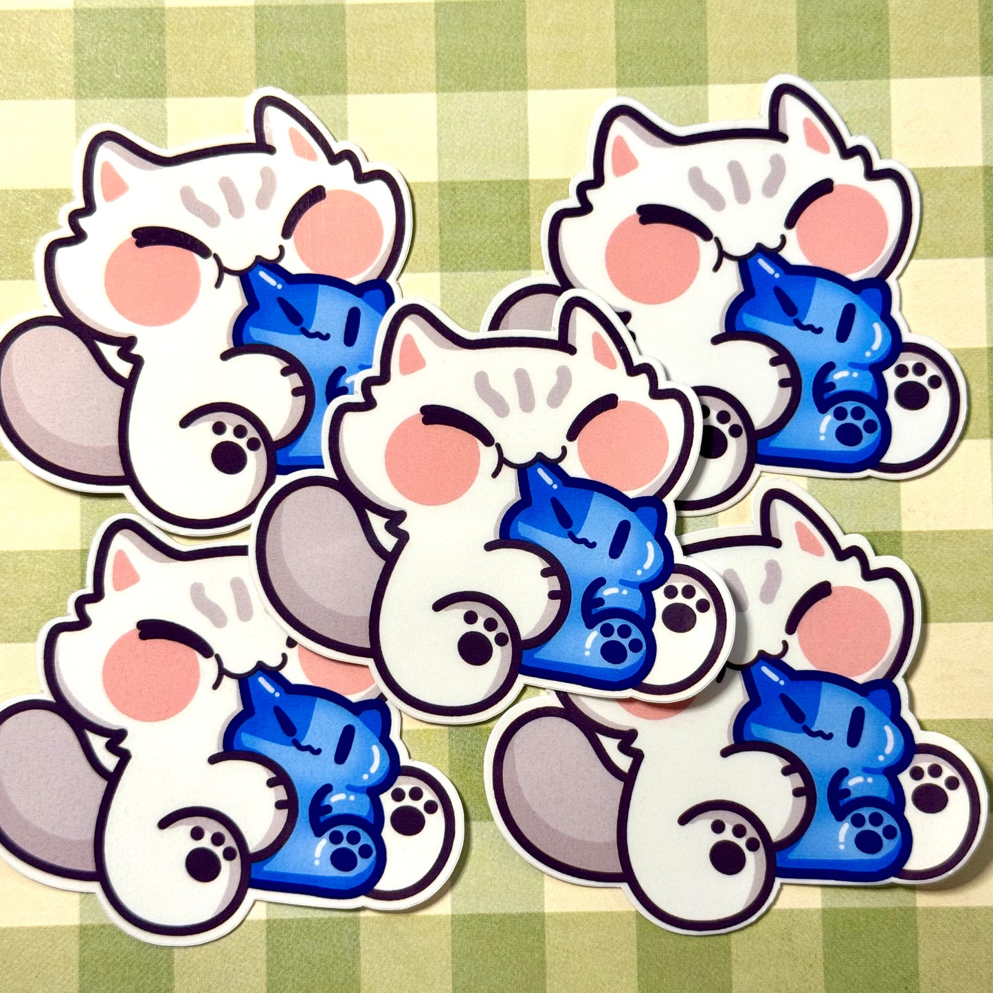 Cat eating gummy Stickers