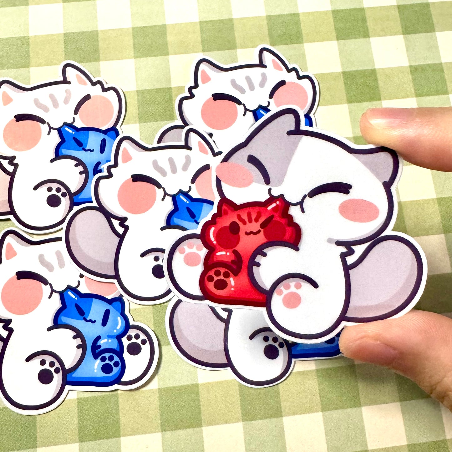 Cat eating gummy Stickers