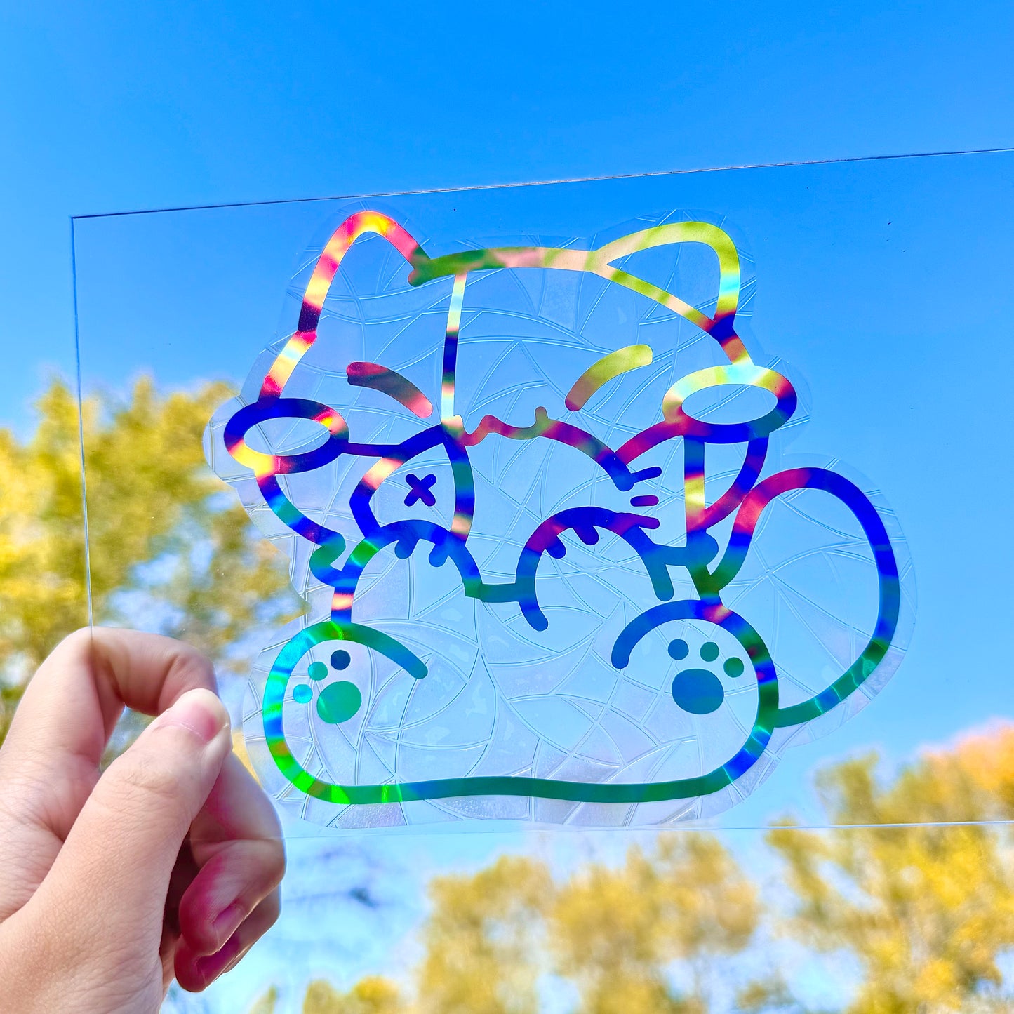 Cute cat eating fish Suncatcher