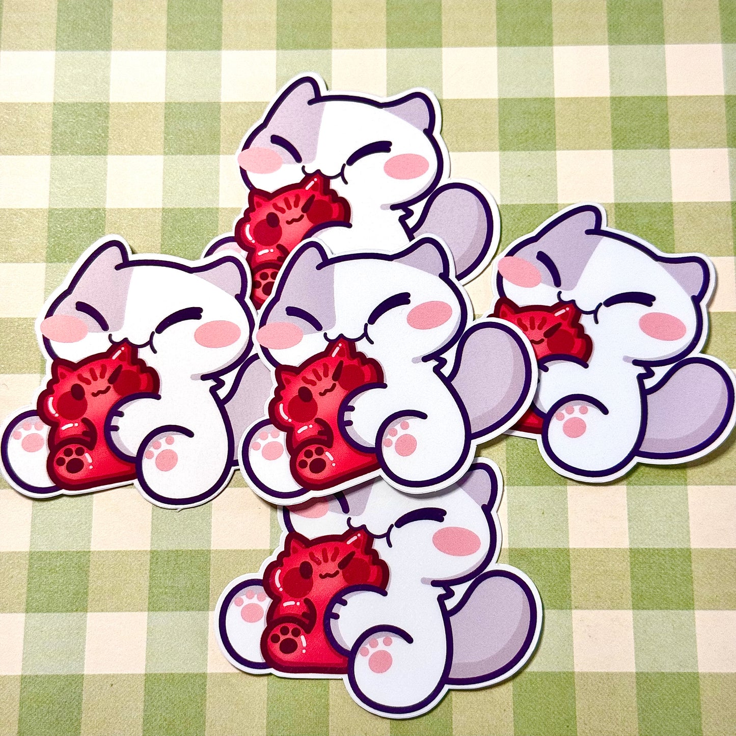 Cat eating gummy Stickers