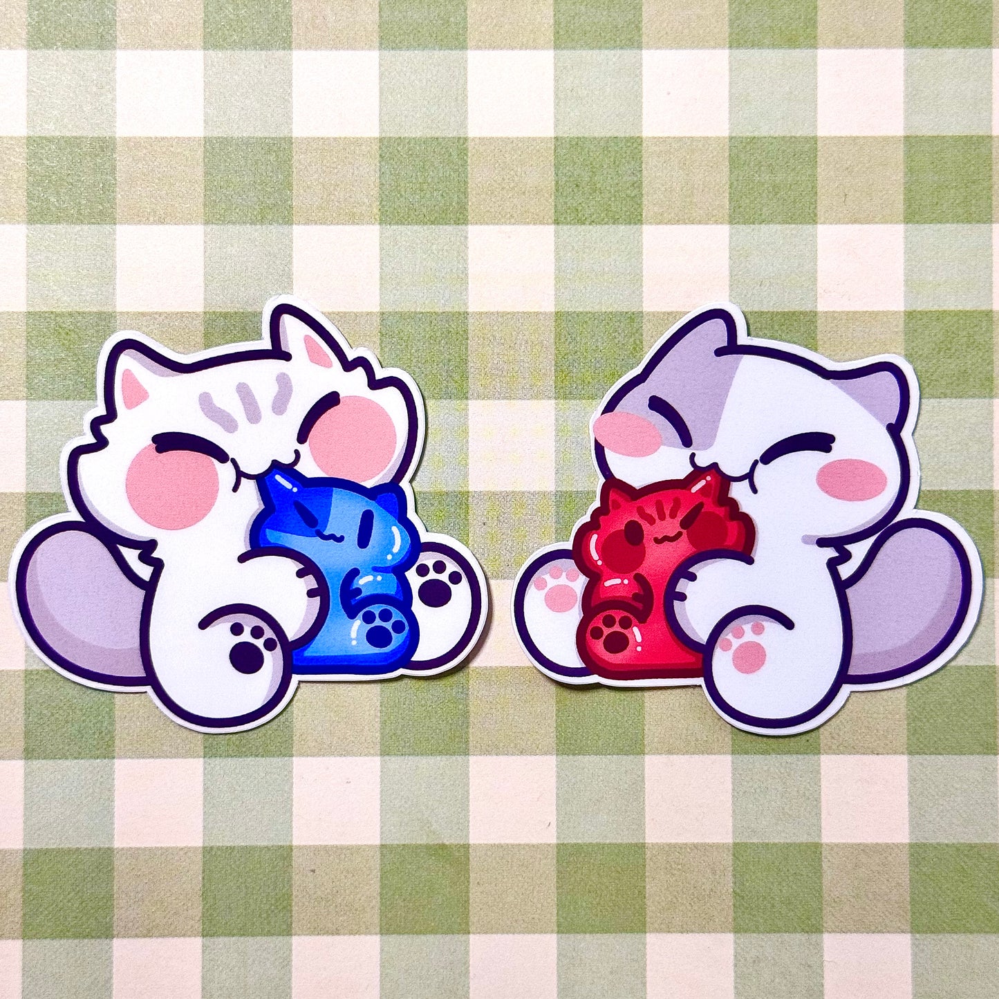 Cat eating gummy Stickers