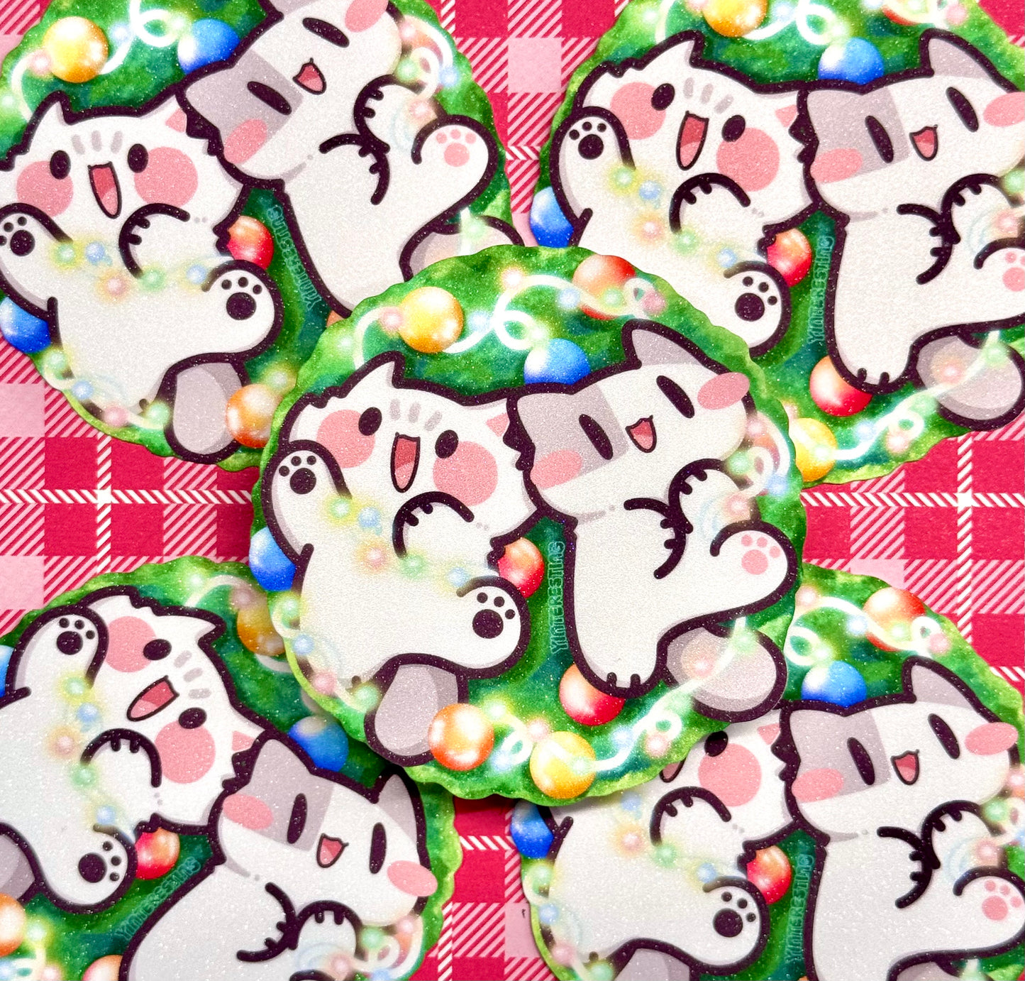 Meows playing with Christmas Lights Sticker